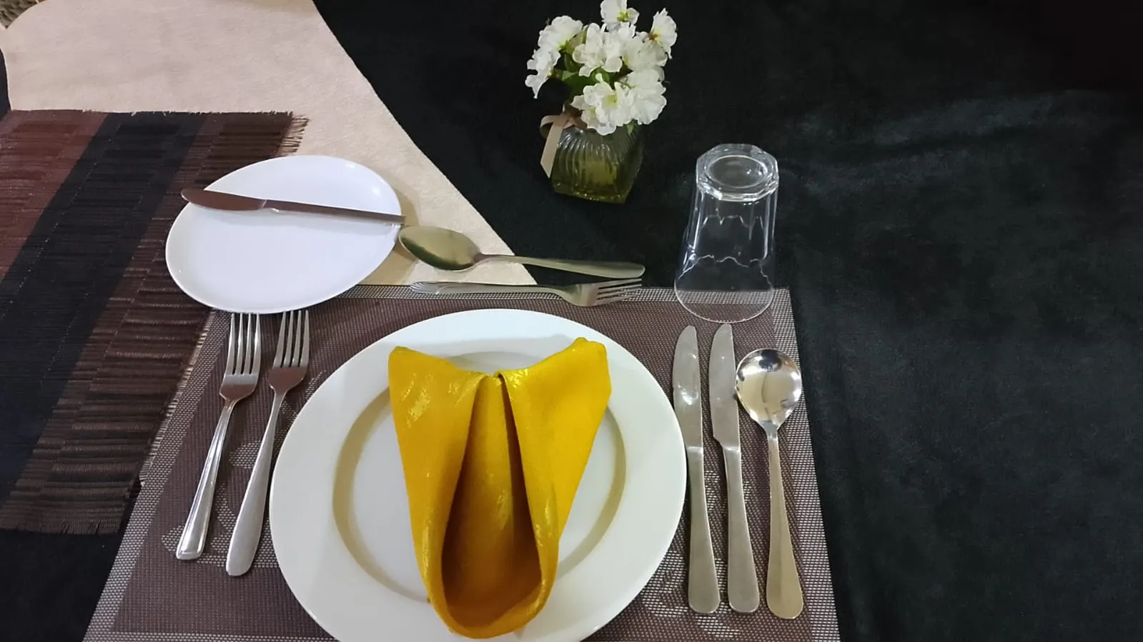 A table set for a meal at the Generis Hotel restaurant